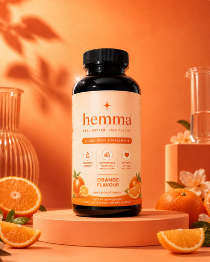 hemma liquid iron supplement, orange flavour, 16 fl oz bottle with cream and orange label
