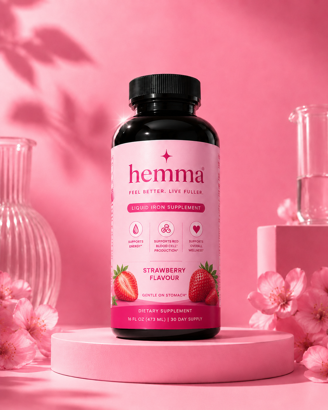 hemma liquid iron supplement, strawberry flavour, 16 fl oz bottle with pink label